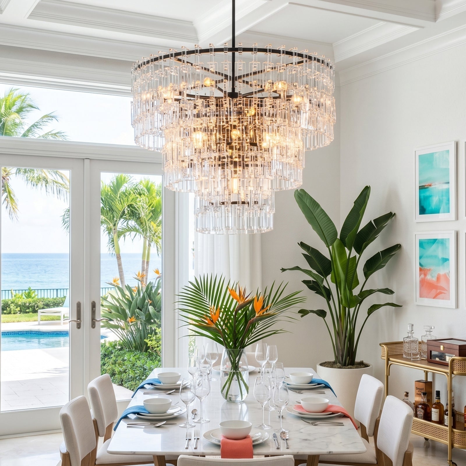 Handblown Glass Chandeliers: Why Artisan Glass Lighting Is Always In Vogue in a bright dining space.