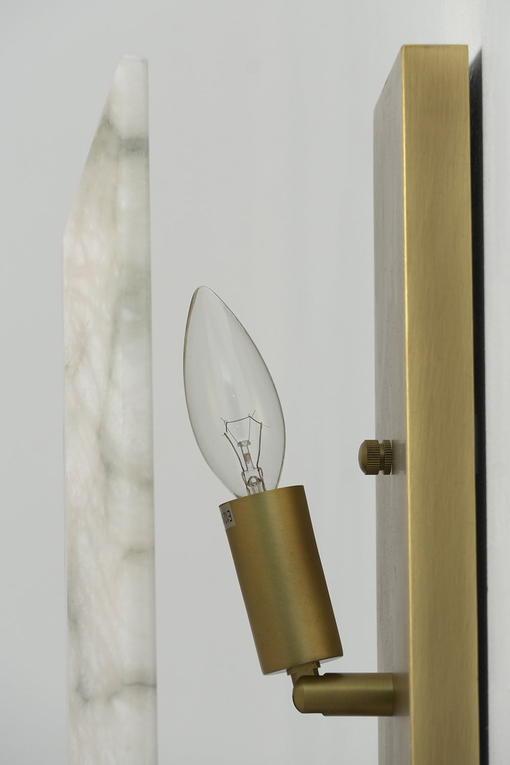 Internal view of alabaster wall sconce with bulb | Brass, Alabaster | Showing the candle bulb and brass socket | Samu Lamp