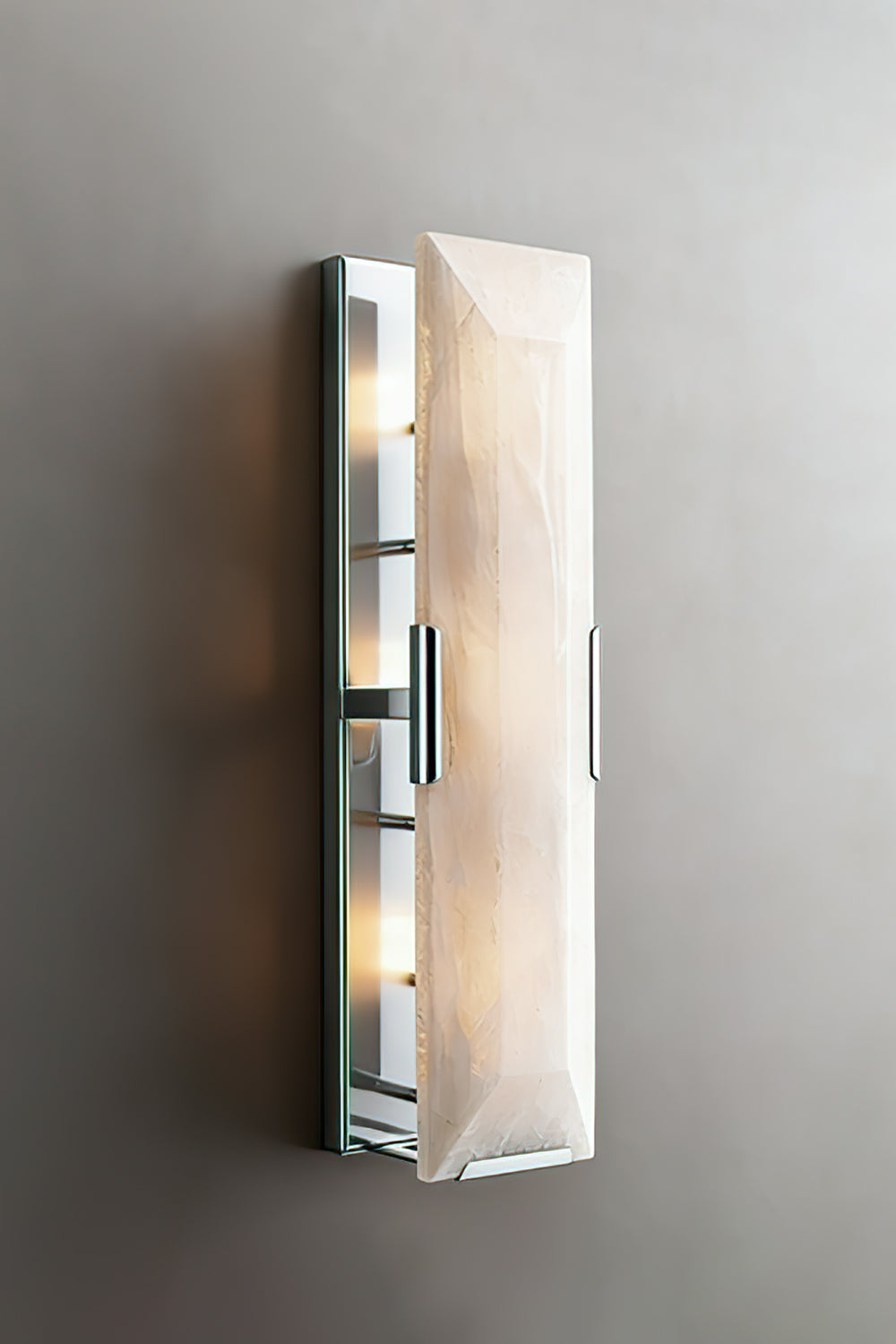 Lit rectangular alabaster lamp with chrome finish | Metal, Alabaster | Front view against a gray studio background | Samu Lamp