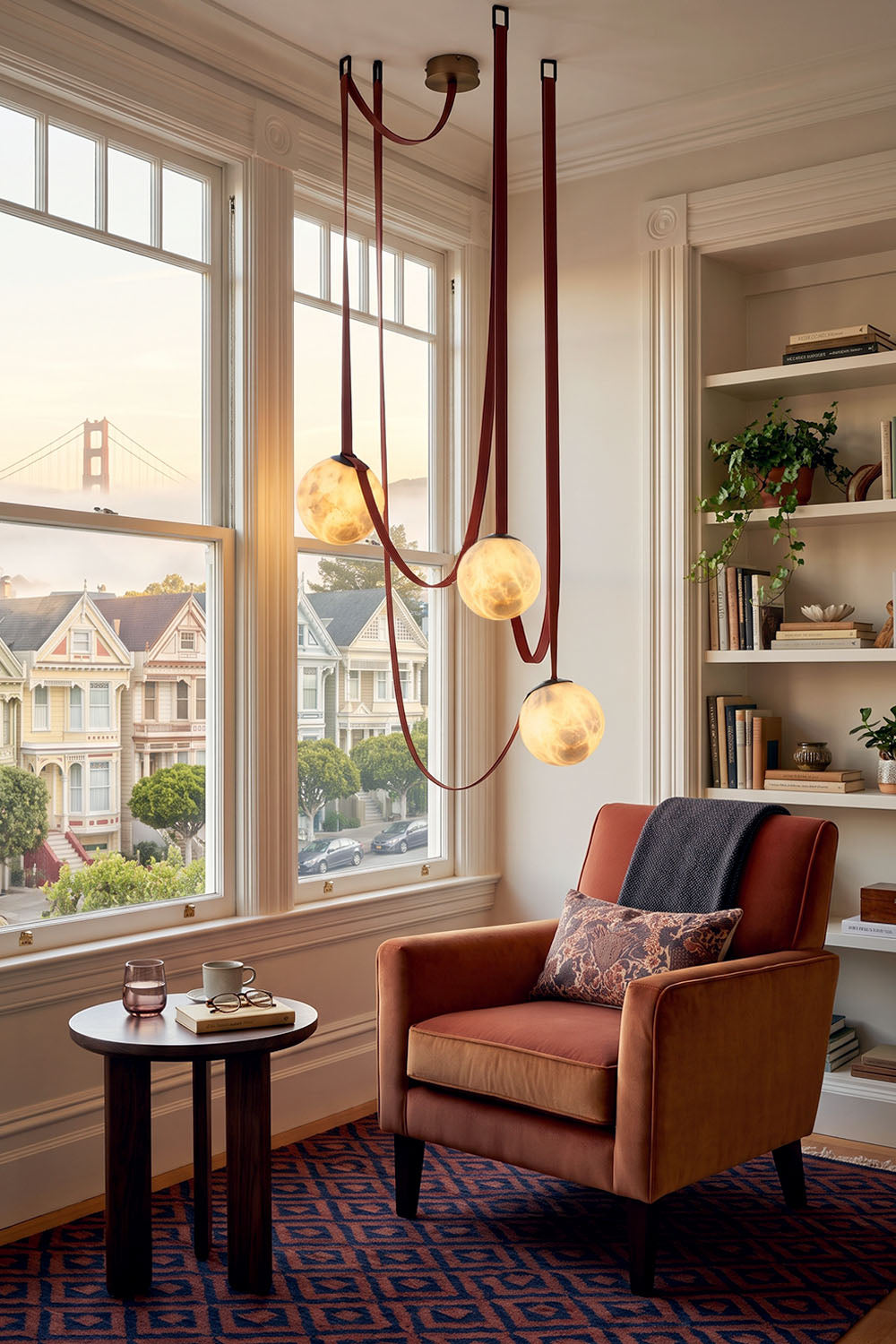 Albiane Draped Chandelier | Alabaster and Woven Rope | Illuminated beside armchair and window bookcase nook | Samu Lamp