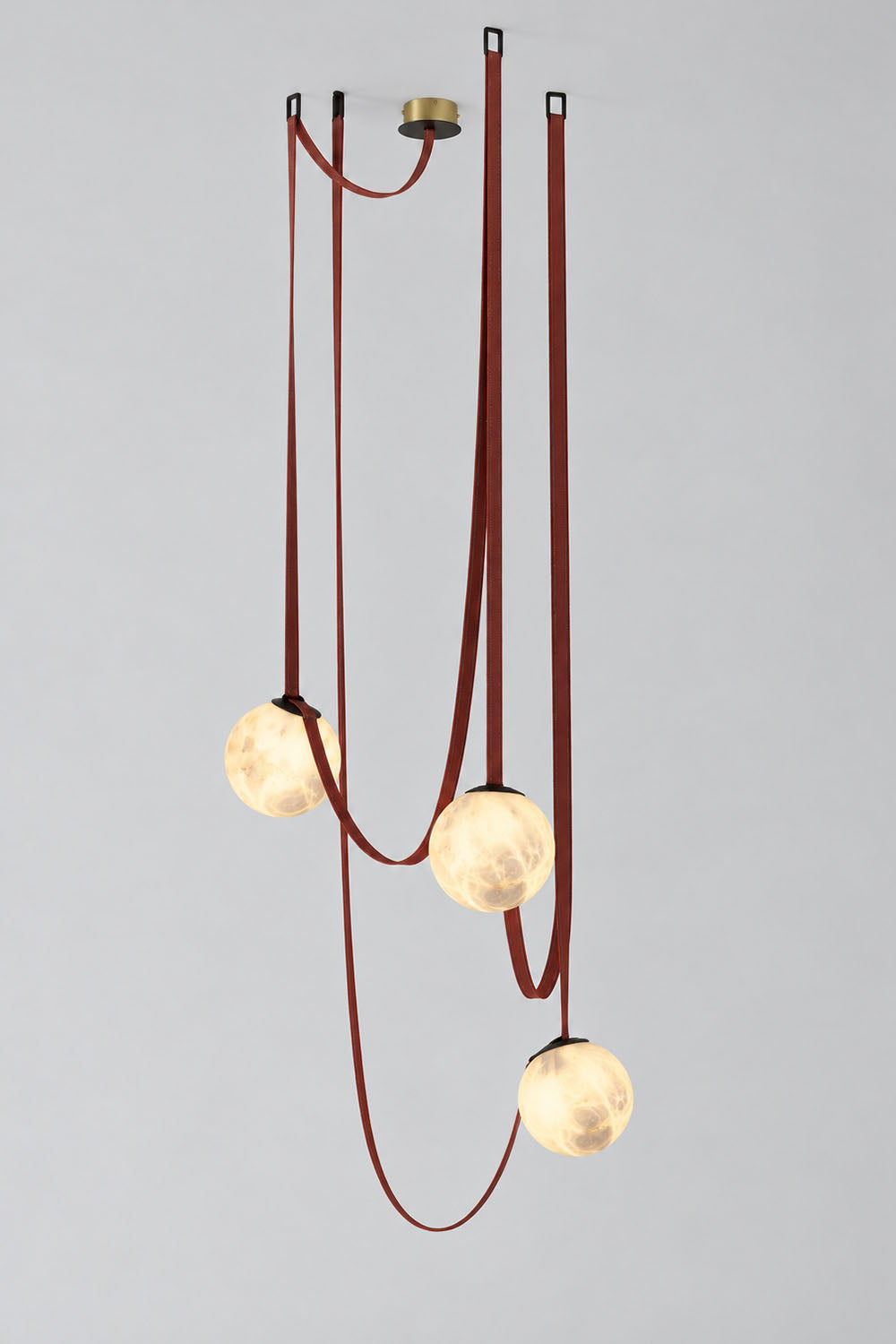 Albiane Draped Chandelier | Alabaster and Woven Rope | Compact 3-globe vertical cluster lit on white backdrop | Samu Lamp