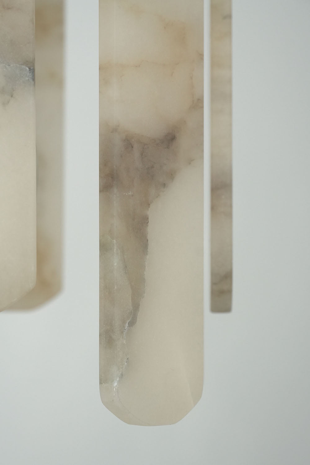 Albrenne Alabaster Mini Pendant | Natural Carved Alabaster | Macro detail of organic mineral veining on slats | Samu Lamp