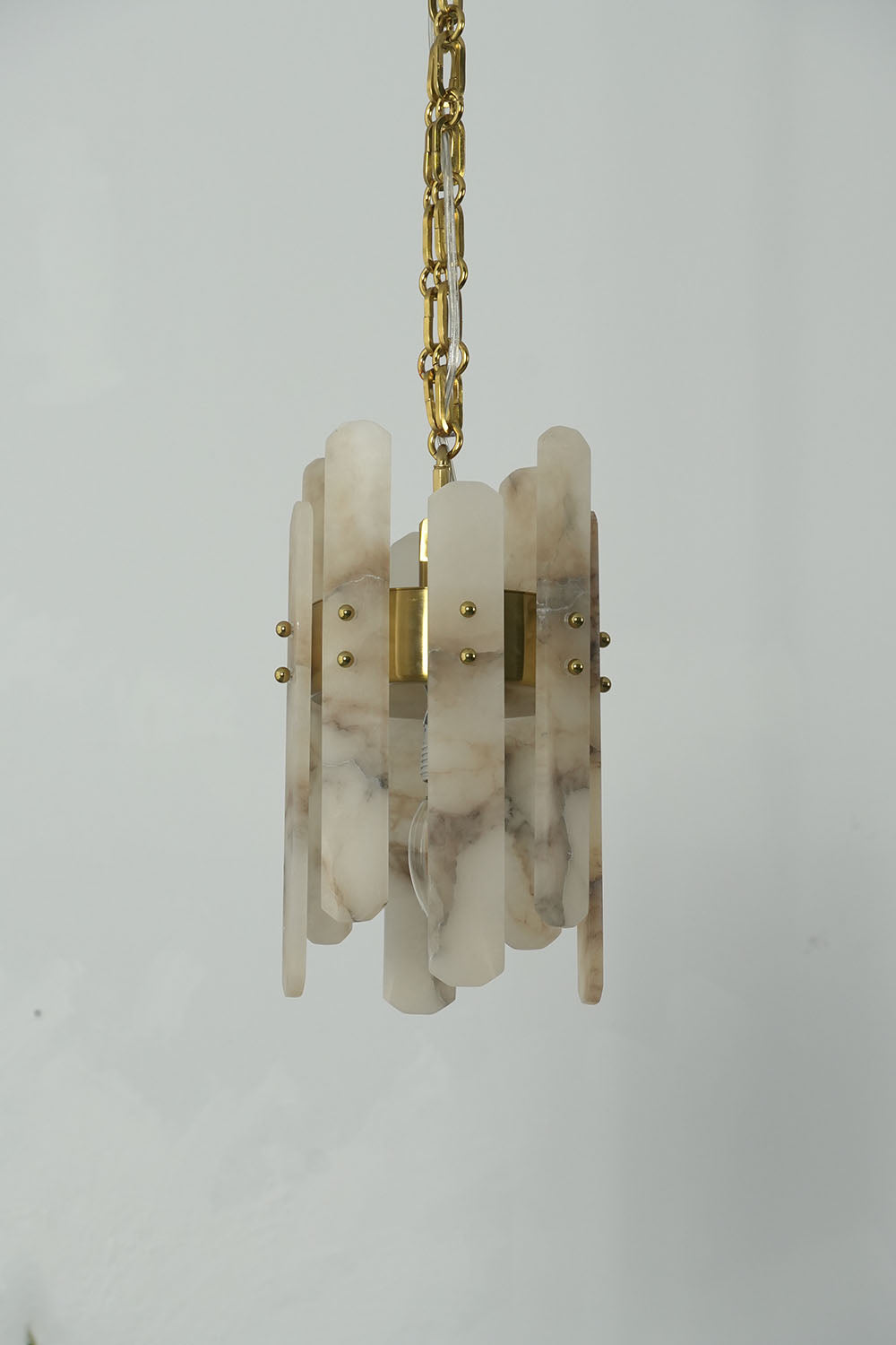 Albrenne Alabaster Mini Pendant | Natural Stone and Brass | Vertical unlit profile highlighting stone texture | Samu Lamp