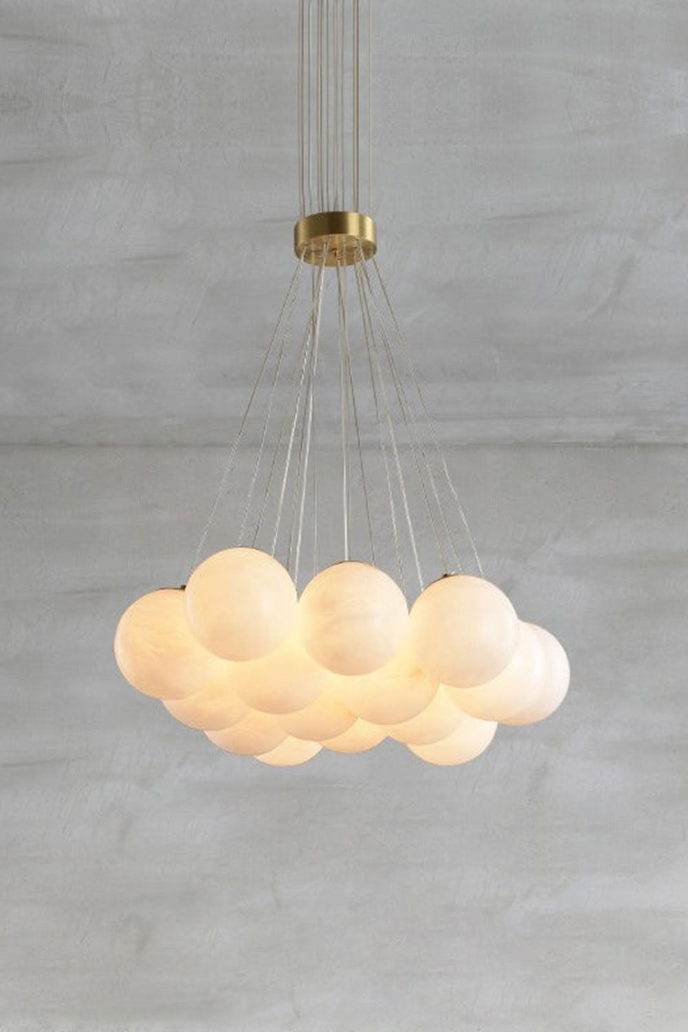 Amandine Alabaster Globe Cluster Pendant Light featuring elegant clustered alabaster globes on a modern chandelier.