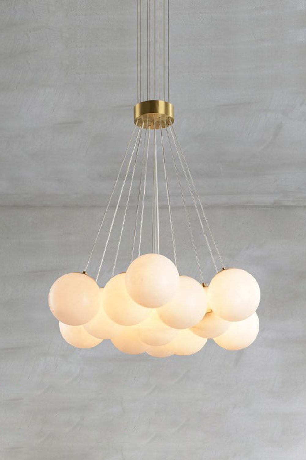 Amandine Alabaster Globe Cluster Pendant Light featuring a clustered design of alabaster globes.