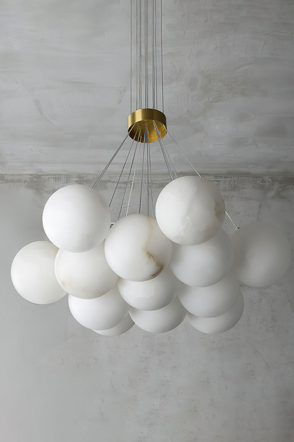 Amandine Alabaster Globe Cluster Pendant Light featuring elegant alabaster globes in a clustered design.