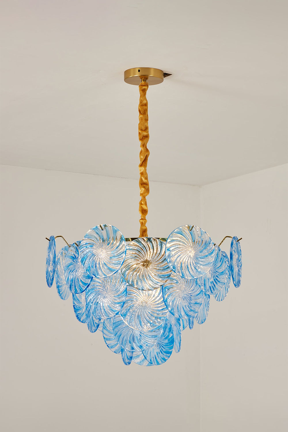Amara Pink Glass Petal Chandelier | Unlit Blue Variation | Front studio view of the blue glass petal chandelier displaying its natural coloration against a clean light grey backdrop | Samu Lamp