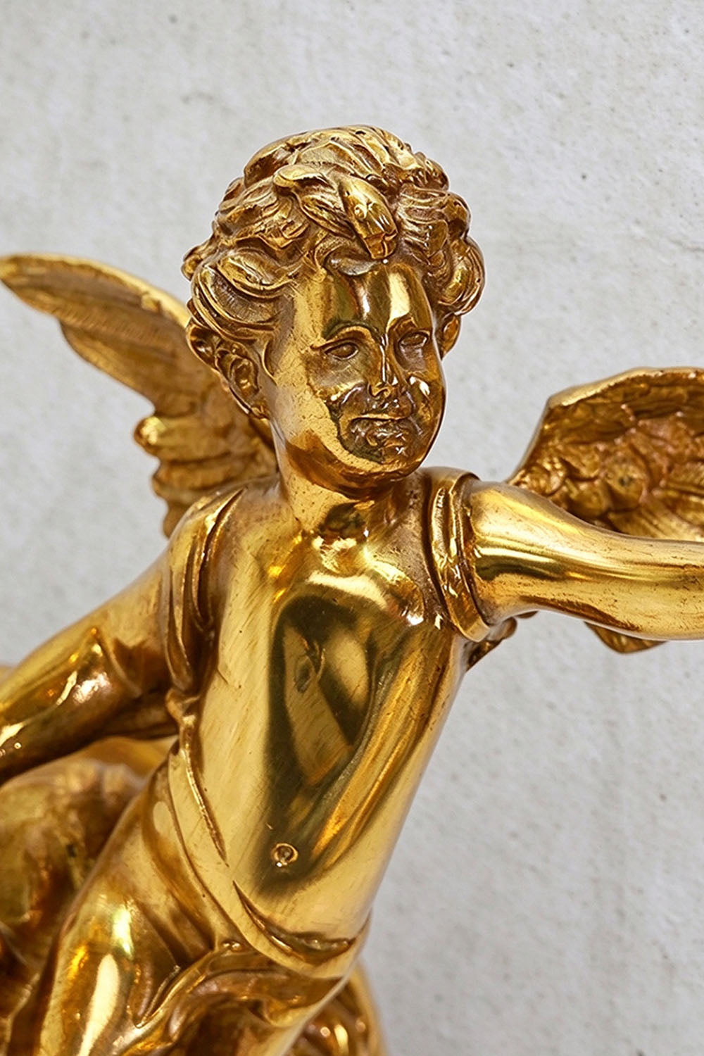 Ambrelise Cherub Wall Sconce | Solid Cast Brass | Detailed close-up of sculpted angel figure with wings | Samu Lamp