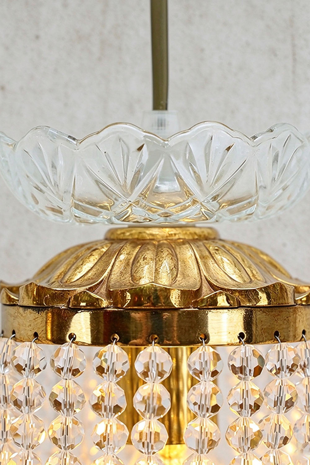 Ambrelise Cherub Wall Sconce | Glass and Cast Brass | Close-up of scalloped glass shade and brass support ring | Samu Lamp