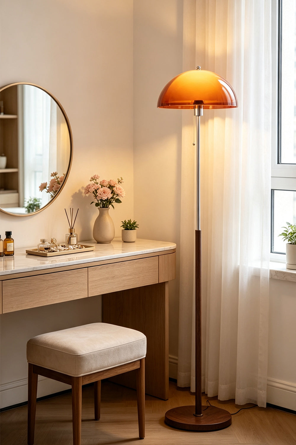 Ambrose Amber Dome Floor Lamp | Amber Glass, Metal and Wood | Styled next to a dressing table with a vanity mirror | Samu Lamp