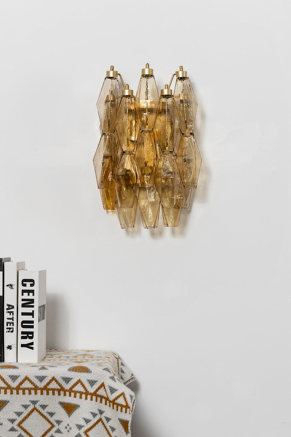 Unlit amber Art Poliedri wall lamp | Metal, Glass | Installed on a clean white wall in a modern classic interior | Samu Lamp