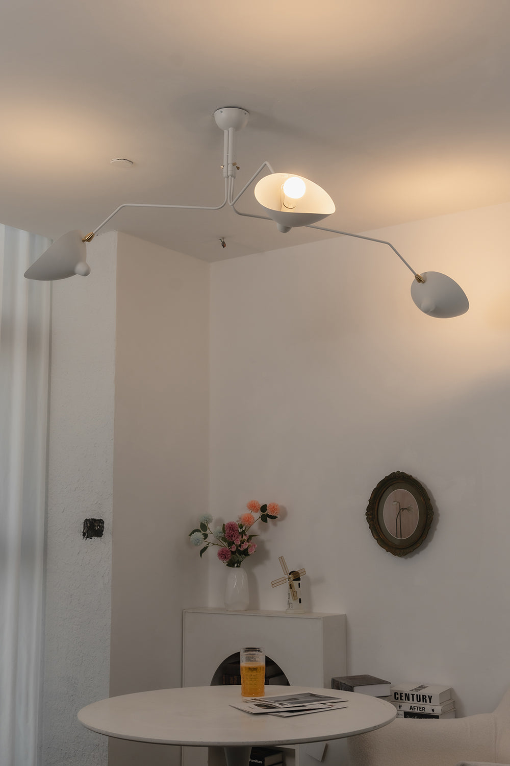 White 3-arm multi arm spider ceiling light | Metal | Modern cafe interior scene with minimalist decor | Samu Lamp