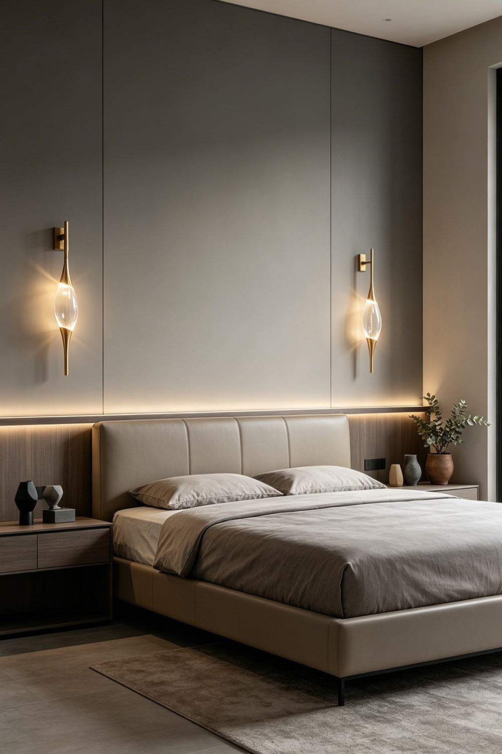 Astraea Crystal Linear Wall Sconce | Crystal, Brass | A pair of lit crystal sconces flanking a modern grey bed in a luxurious moody bedroom setting | Samu Lamp