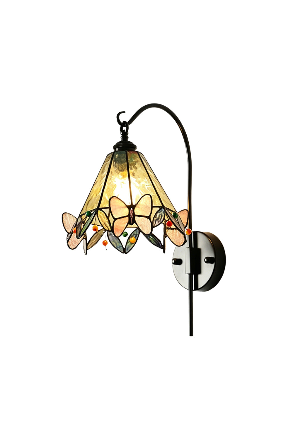 Aura Vine Stained Glass Wall Sconce | Glass, Metal | Fully lit Tiffany-style stained glass wall sconce with yellow textured panels and pink butterfly accents hanging from a curved black metal arm | Isolated lit product shot on white background | Samu Lamp