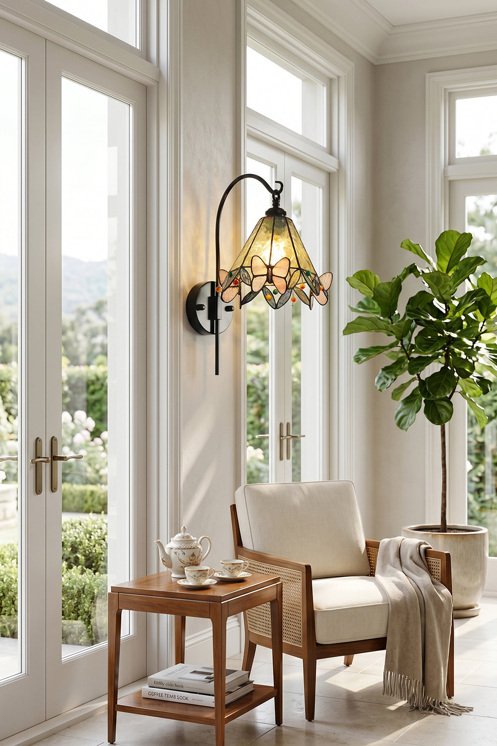 Aura Vine Stained Glass Wall Sconce | Glass, Metal | Providing a warm glow in a sunlit room corner with a comfortable white armchair and a small wooden side table near French doors | Samu Lamp