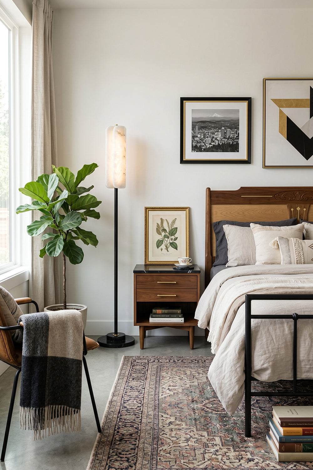 Aurelius Alabaster Brass Floor Lamp | Alabaster, Brass | Providing a soft warm bedside glow in a cozy bedroom next to a dark wood nightstand and a classic platform bed frame | Samu Lamp