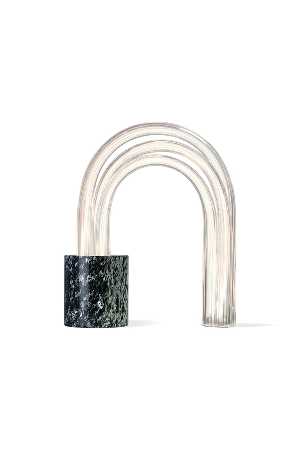 Aurelius Ribbed Marble Table Lamp with a marble base and glass shade, showcasing elegant design and warm light.