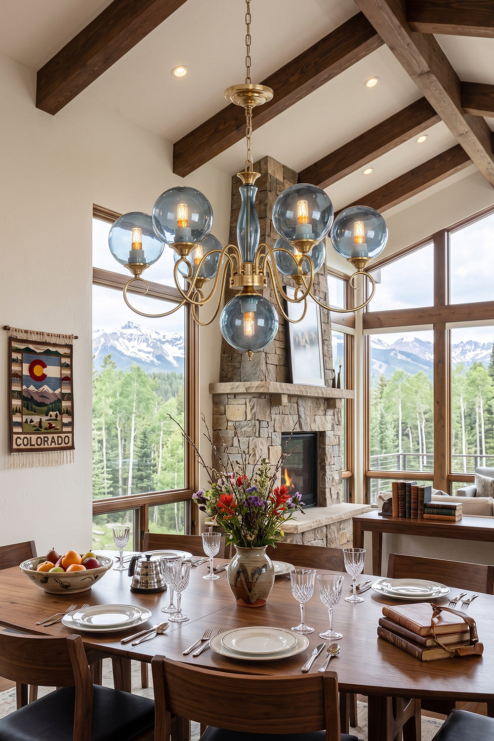 Aveline Globe Cluster Chandelier | Colored Glass and Brass | Blue glass version in a high-ceiling dining room with scenic mountain views | Samu Lamp