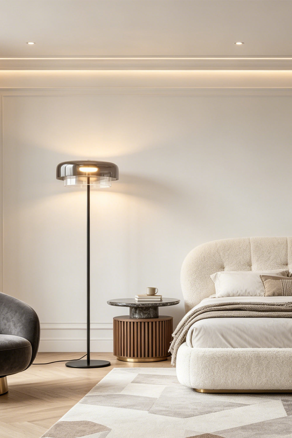 Aven Minimalist Architectural Floor Lamp | Glass, Metal | Minimalist floor light glowing softly against a clean white bedroom wall next to a cozy upholstered platform bed | Samu Lamp