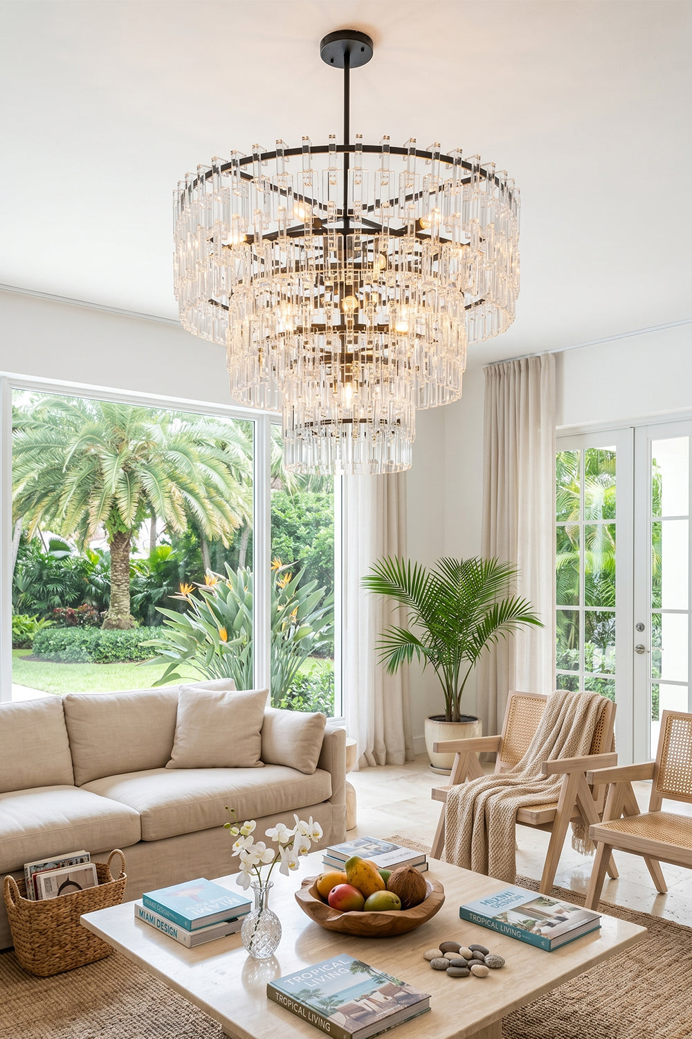 Aven Tiered Glass Prism Chandelier | Glass, Metal | Illuminating a luxurious beach house living room featuring a plush cream sectional sofa and tropical indoor plants | Samu Lamp