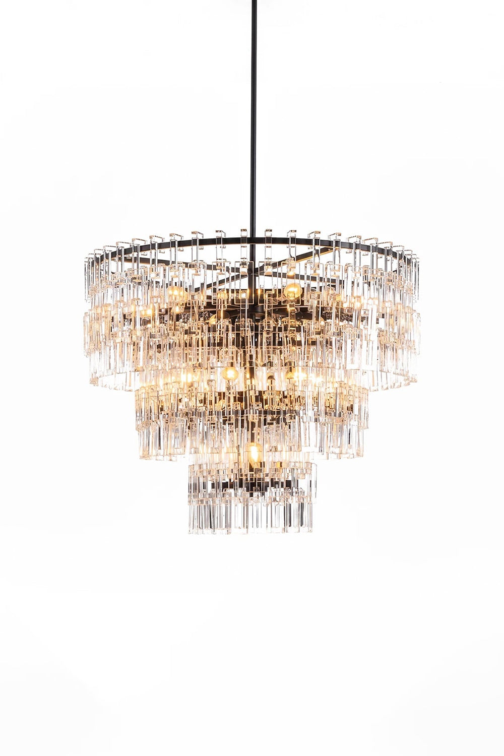 Aven Tiered Glass Prism Chandelier | Glass, Metal | Fully illuminated multi-tiered crystal prism chandelier featuring interlocking clear glass links and a sleek black metal frame | Isolated lit product shot on white background | Samu Lamp