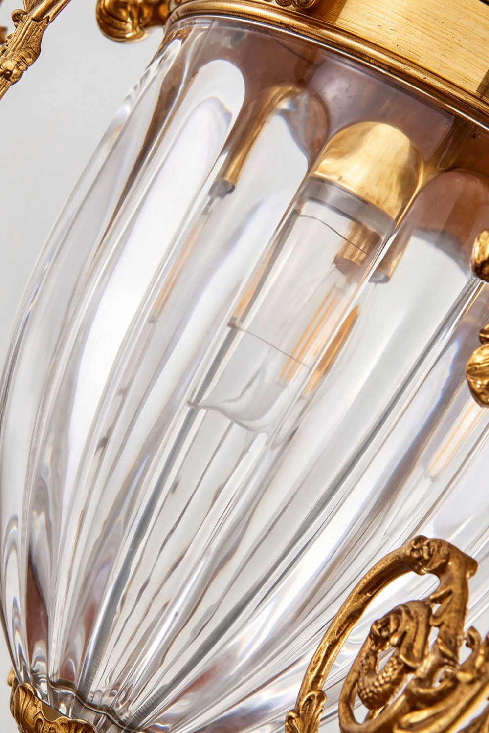 Aveyron Brass Urn Candle Chandelier | Solid Brass and Glass | Macro close-up of the ribbed glass urn center and cast brass fittings | Samu Lamp