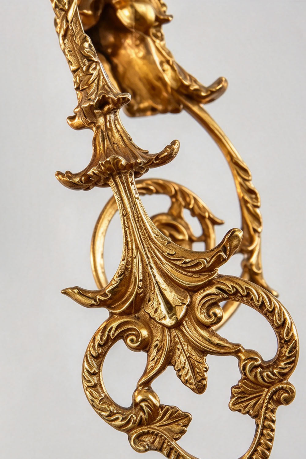 Aveyron Brass Urn Candle Chandelier | Solid Brass and Glass | Macro detail of the intricate brass acanthus leaf and scroll ornament | Samu Lamp