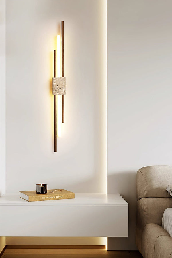 Axis Terra wall light above a floating console | Travertine, Metal, Glass | Living room scene with modern decor | Samu Lamp