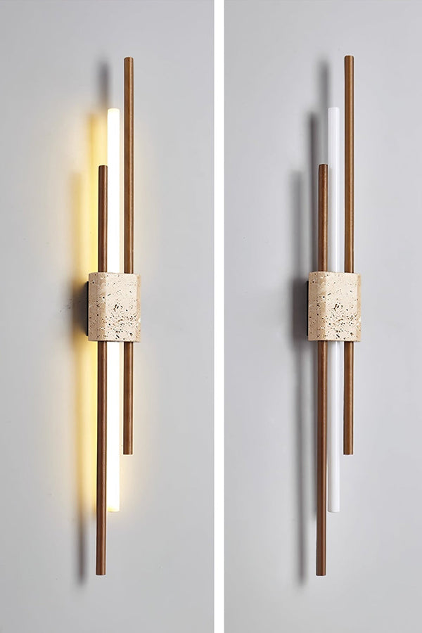 Detailed close-up of Axis Terra wall light | Travertine, Metal, Glass | Showing the lit glass tubes and stone texture | Samu Lamp