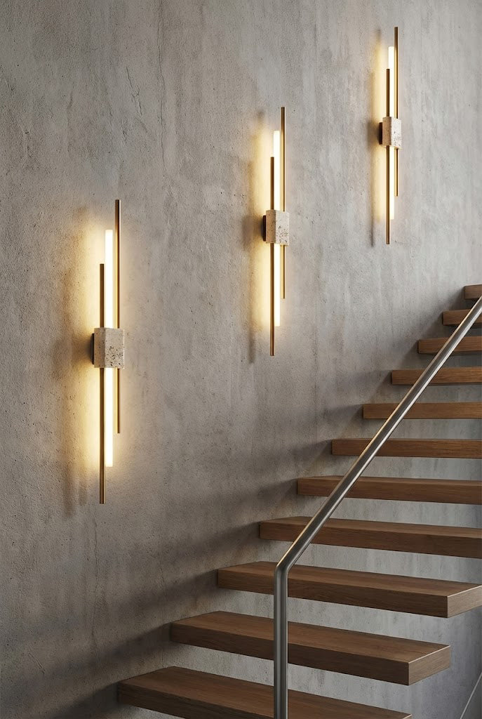 Trio of Axis Terra wall lights on a staircase wall | Travertine, Metal, Glass | Modern lighting installation in a stairwell | Samu Lamp