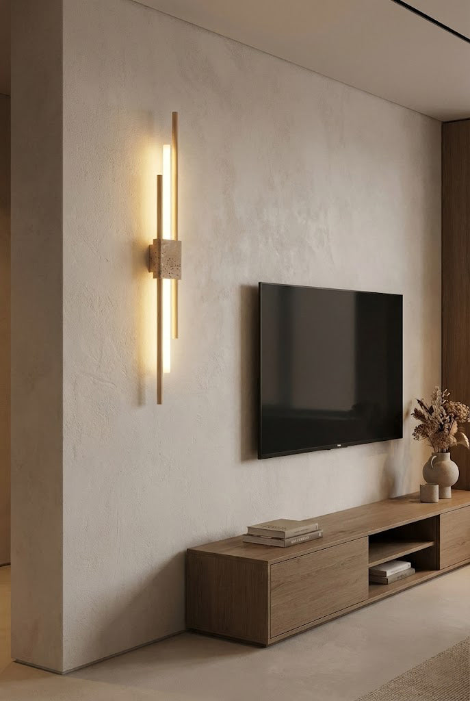 Linear Axis Terra wall sconce next to a TV | Travertine, Metal, Glass | Modern living room wall lighting | Samu Lamp