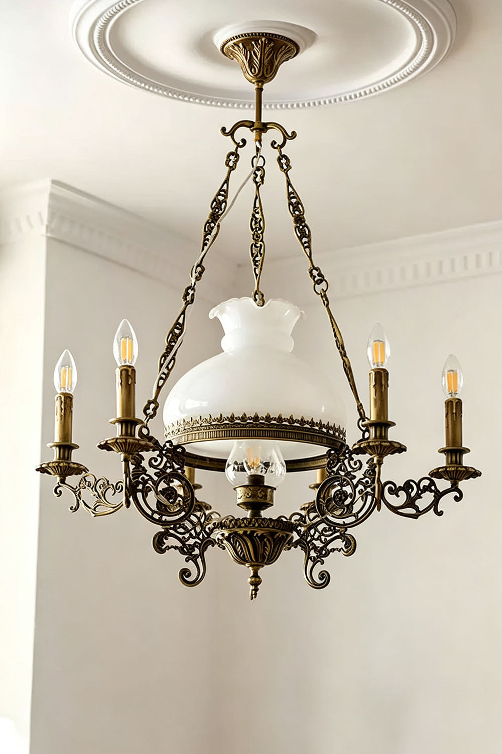 Barnaby Domed Glass Brass Chandelier featuring an ornate design and vintage-inspired lamps.