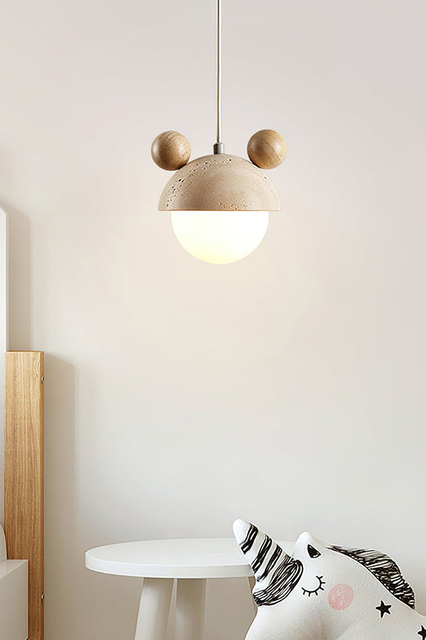 Playful bear ear pendant lamp in a kids' area | Travertine, Metal, Glass | Positioned over a white table with toy unicorn | Samu Lamp