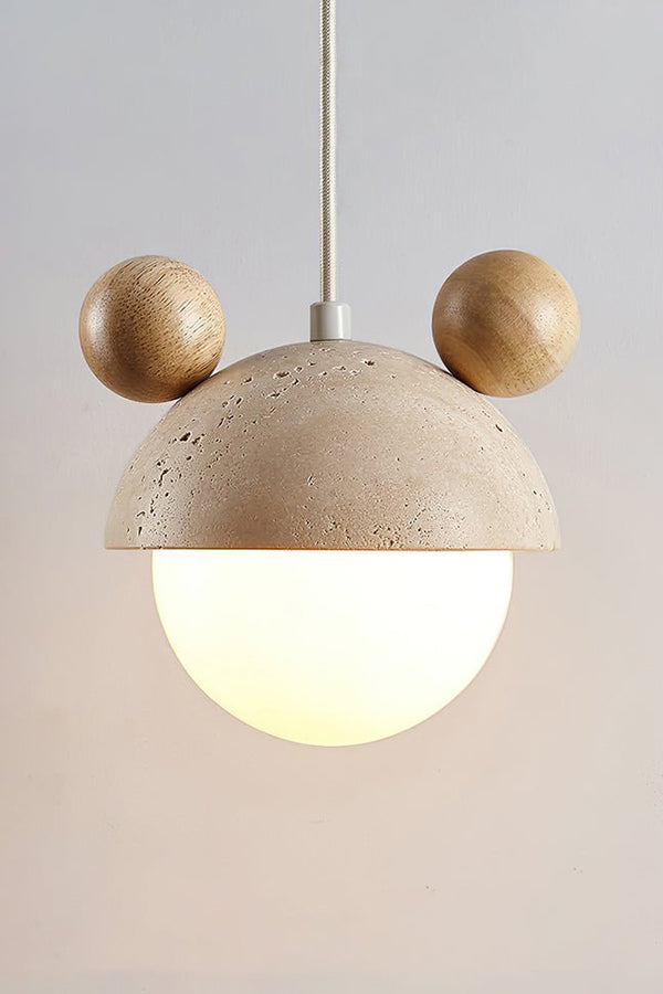 Lit bear ear travertine pendant with light wood ears | Travertine, Metal, Glass | Detailed front shot of the lit globe | Samu Lamp