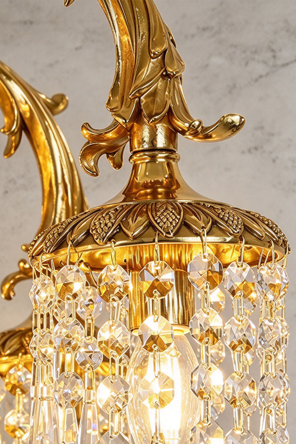 Belcastre Brass Crowned Crystal Cascade Chandelier | Cut Crystal and Brass | Close-up view of the brass arm crown rim and crystal fringe | Samu Lamp