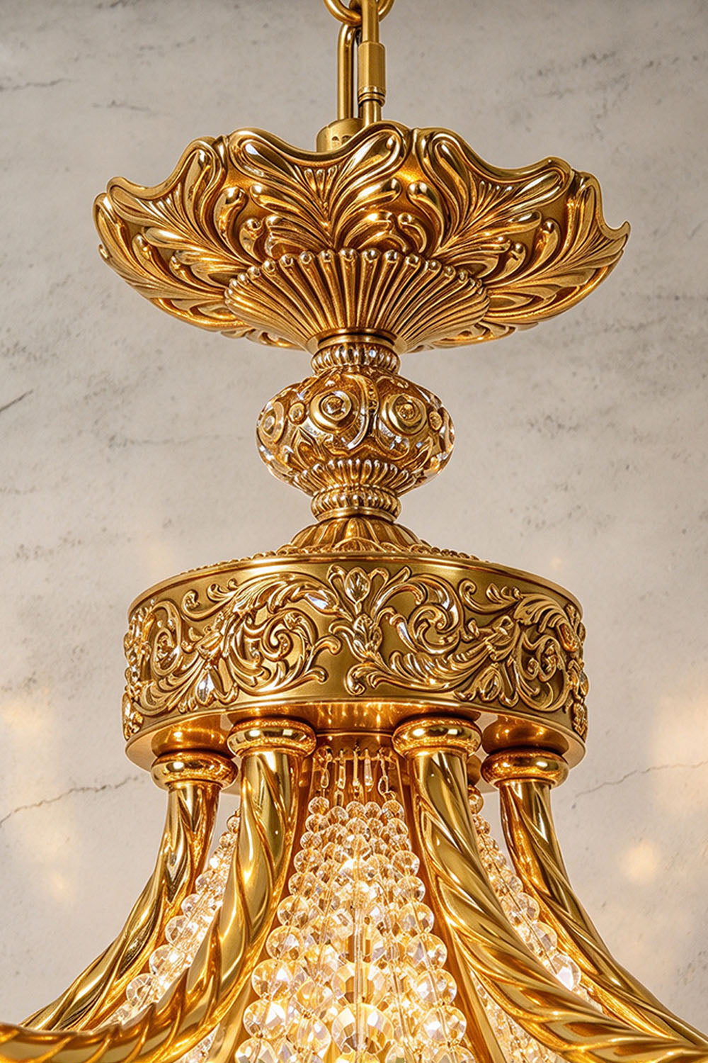 Belcastre Brass Crowned Crystal Cascade Chandelier | Cut Crystal and Brass | Detail shot showing the brass ceiling canopy and center column | Samu Lamp