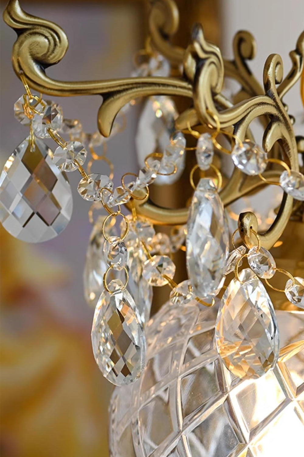 Close-up of a Bertrand Cut Glass Teardrop Pendant Light showcasing crystal teardrops and decorative gold accents.