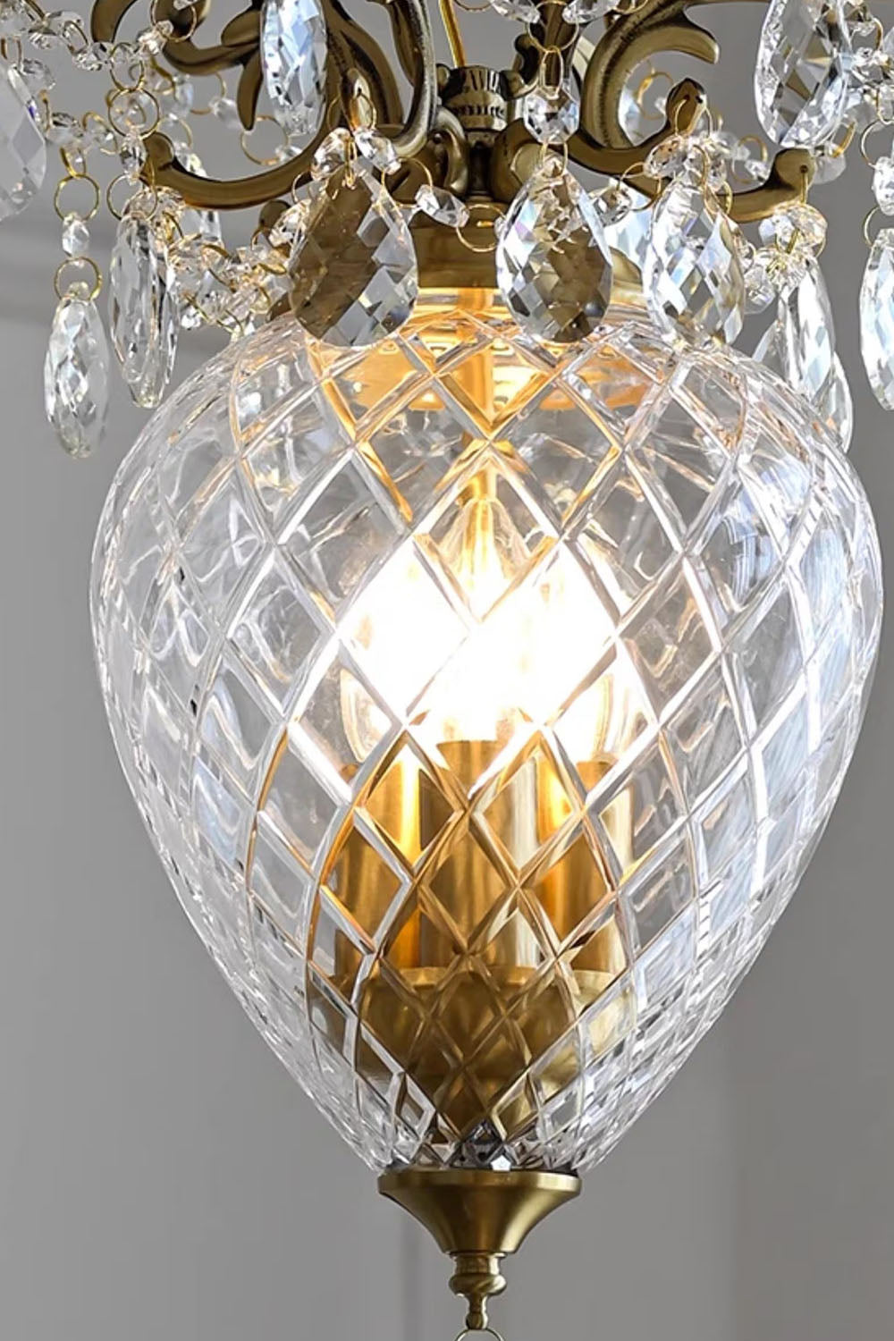 Bertrand Cut Glass Teardrop Pendant Light showcasing elegant crystal design and warm illumination.