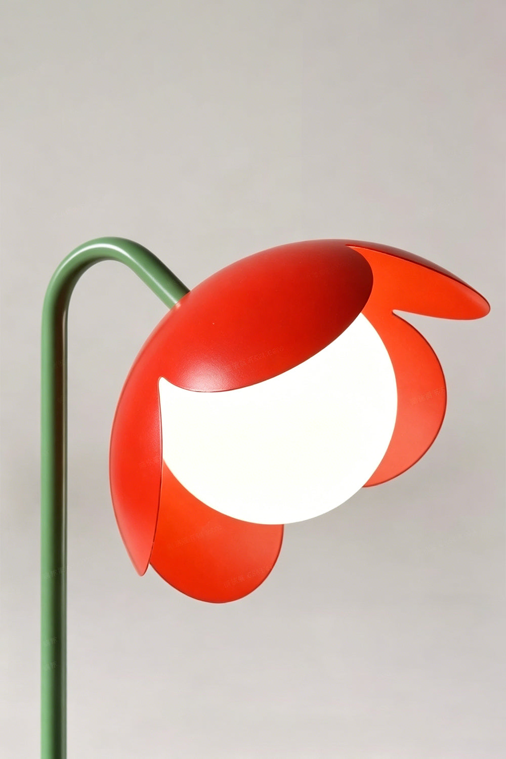 Head detail close-up | Metal and glass | Red petal botanical lamp | Stylized flower with stem and globe | Matte finish | Samu Lamp