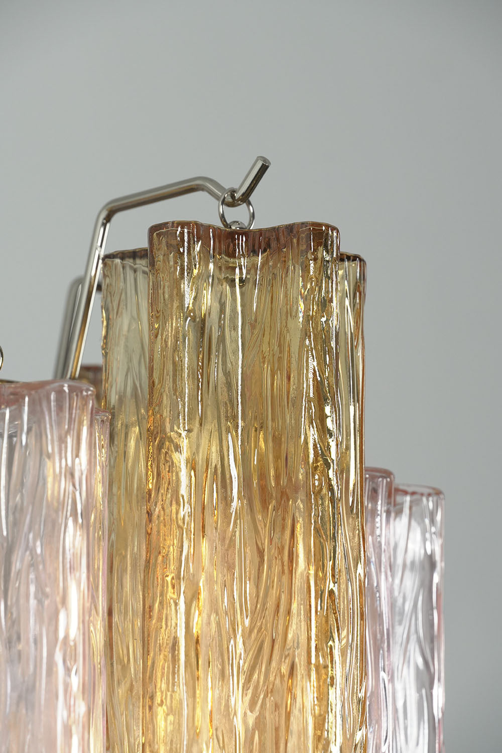 Brevalle Mini Chandelier | Solid Metal Hardware | Close-up of metal hook arm supporting textured glass tube | Samu Lamp