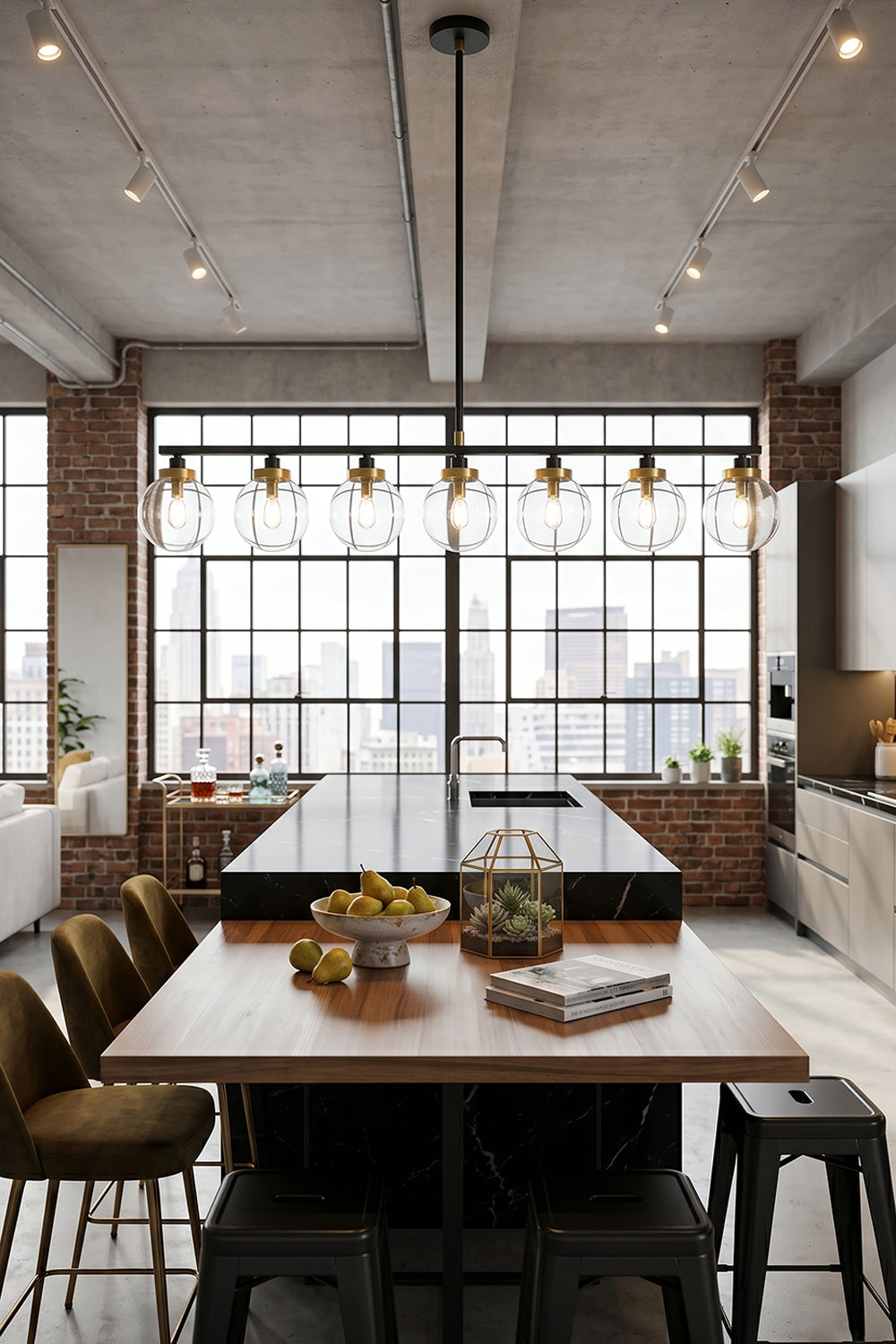 Brooks Linear Glass Globe Chandelier | Glass, Metal | Installed as a bold centerpiece over a long rustic wooden community table with a matching bench in an industrial style space | Samu Lamp