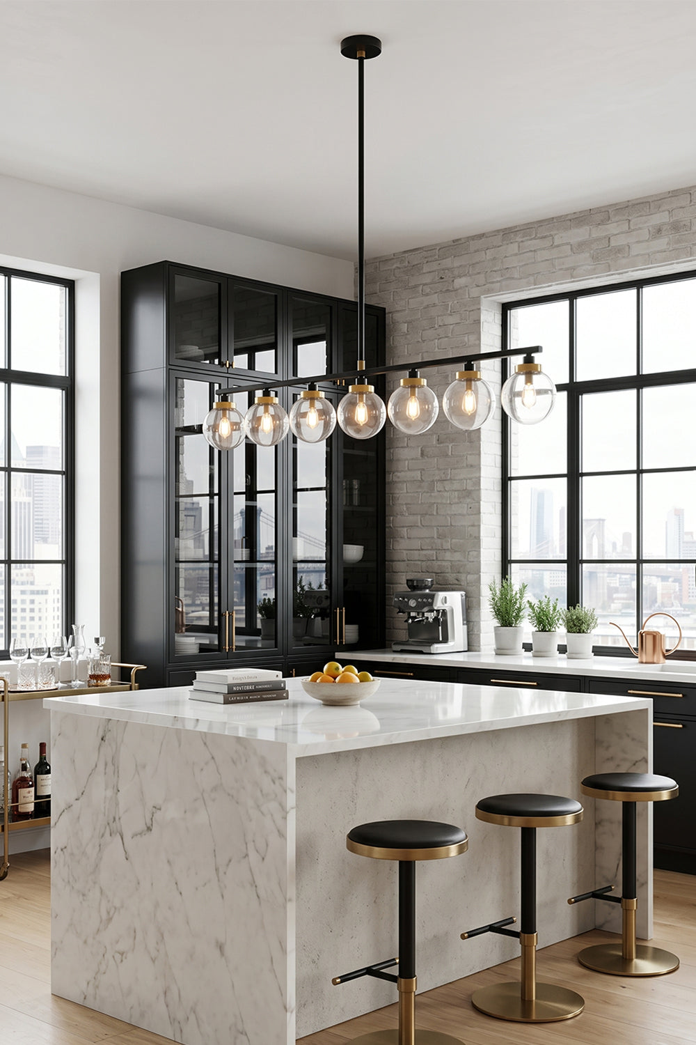 Brooks Linear Glass Globe Chandelier | Glass, Metal | Staged over a luxurious white marble waterfall kitchen island with sleek black barstools in a bright minimalist home layout | Samu Lamp