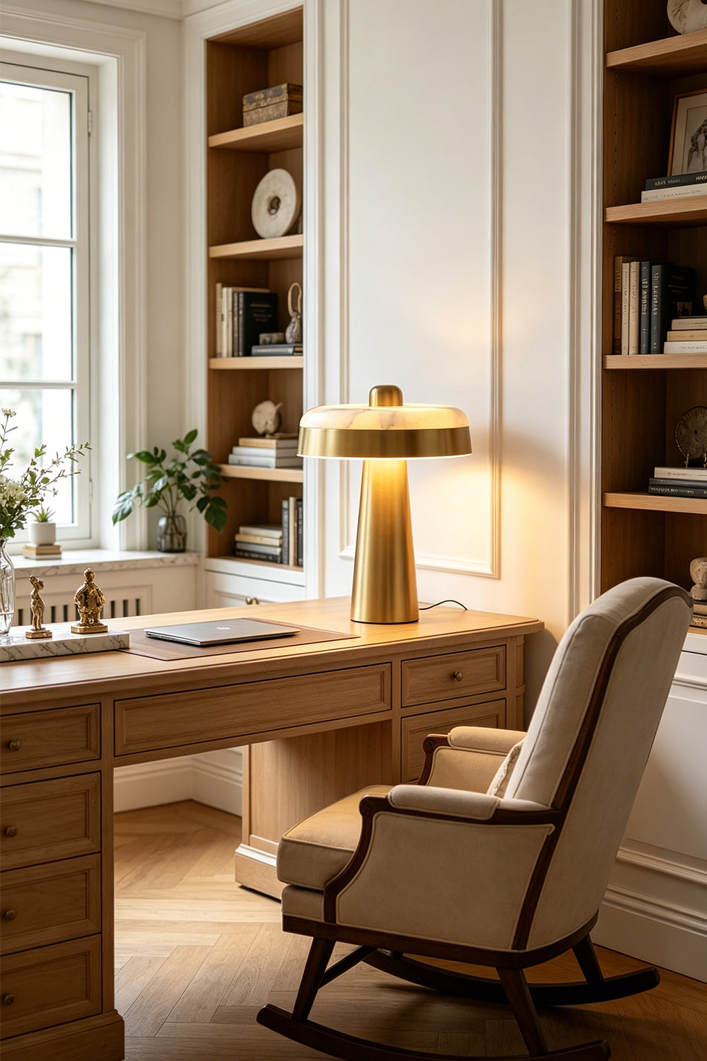 Callista Alabaster Disc Table Lamp | Home Office Lamp | Sitting illuminated on a classic wooden writing desk in a sophisticated home study next to a traditional rocking chair | Samu Lamp
