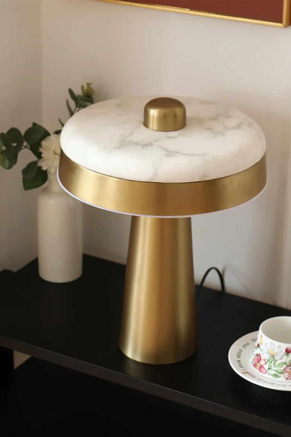 Callista Alabaster Disc Table Lamp | Unlit Stone View | Staged view of the unlit desk lamp highlighting the natural white and grey veining patterns of the polished alabaster disc shade | Samu Lamp
