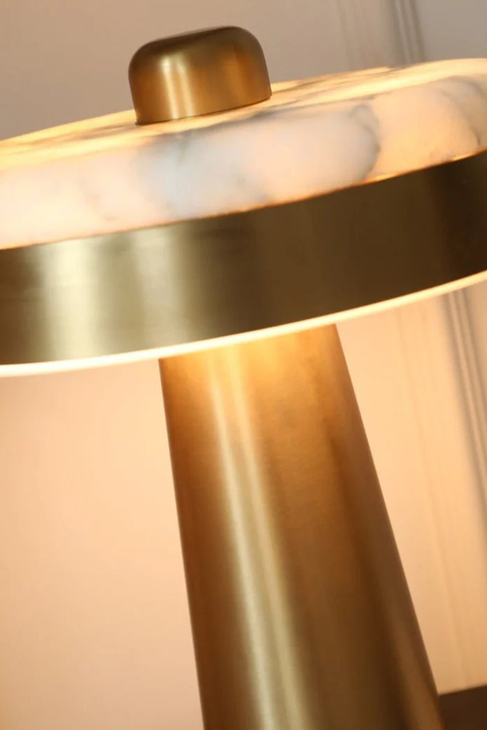 Callista Alabaster Disc Table Lamp | Brass Rim Detail | Close-up macro view of the glowing alabaster disk shade bordered by the premium brushed gold metal band trim | Detail shot | Samu Lamp