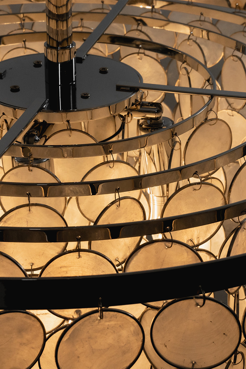 Internal chrome frame of shell ceiling light | Iron | Top-down detail of tiered rings and bulb sockets | Samu Lamp