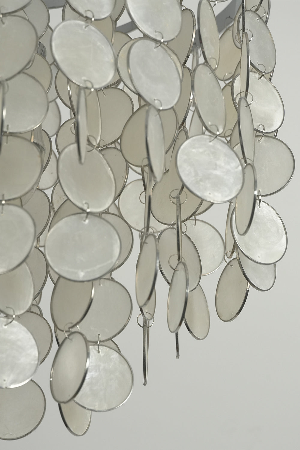 Natural Capiz shell disc texture | Shell | Macro shot of the iridescent surface of unlit shells | Samu Lamp