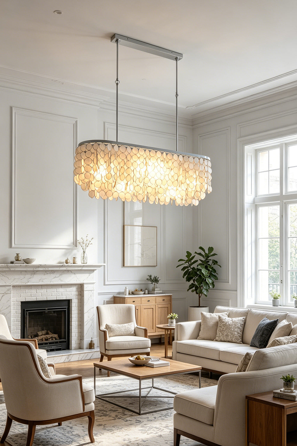 Capiz shell elongated chandelier | Iron | Shell | Wide shot of a bright living and dining open space | Samu Lamp