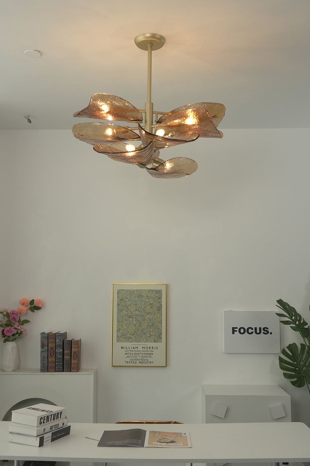 Warm glow textured glass wave chandelier | Metal, Glass | Mounted in a minimalist home office or study area | Samu Lamp