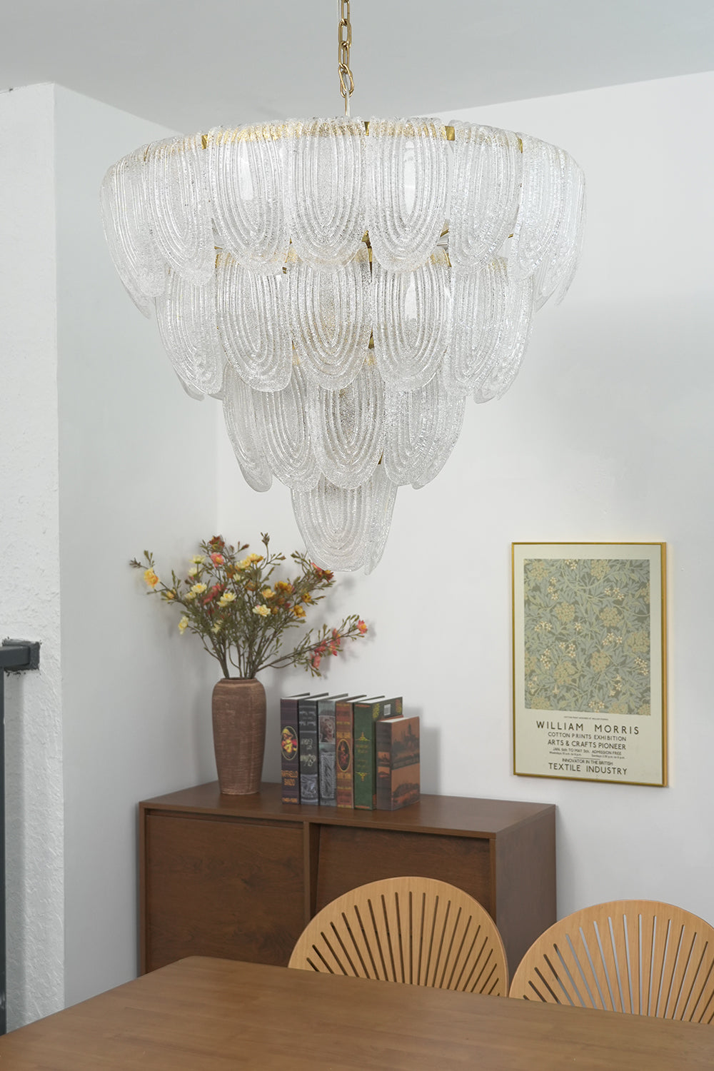 Decorative glass petal chandelier in dining area | Metal, Glass | Interior scene with classic wall art and wooden furniture | Samu Lamp